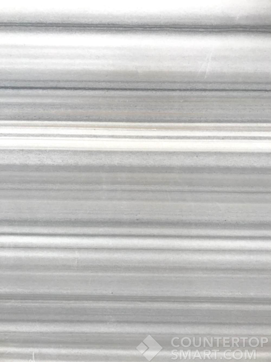 Closeup image of Bianco Mediterraneo Marble countertop slab