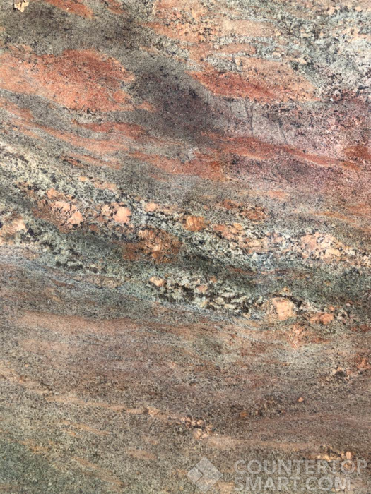 Closeup image of Crema Bordeaux Granite countertop slab