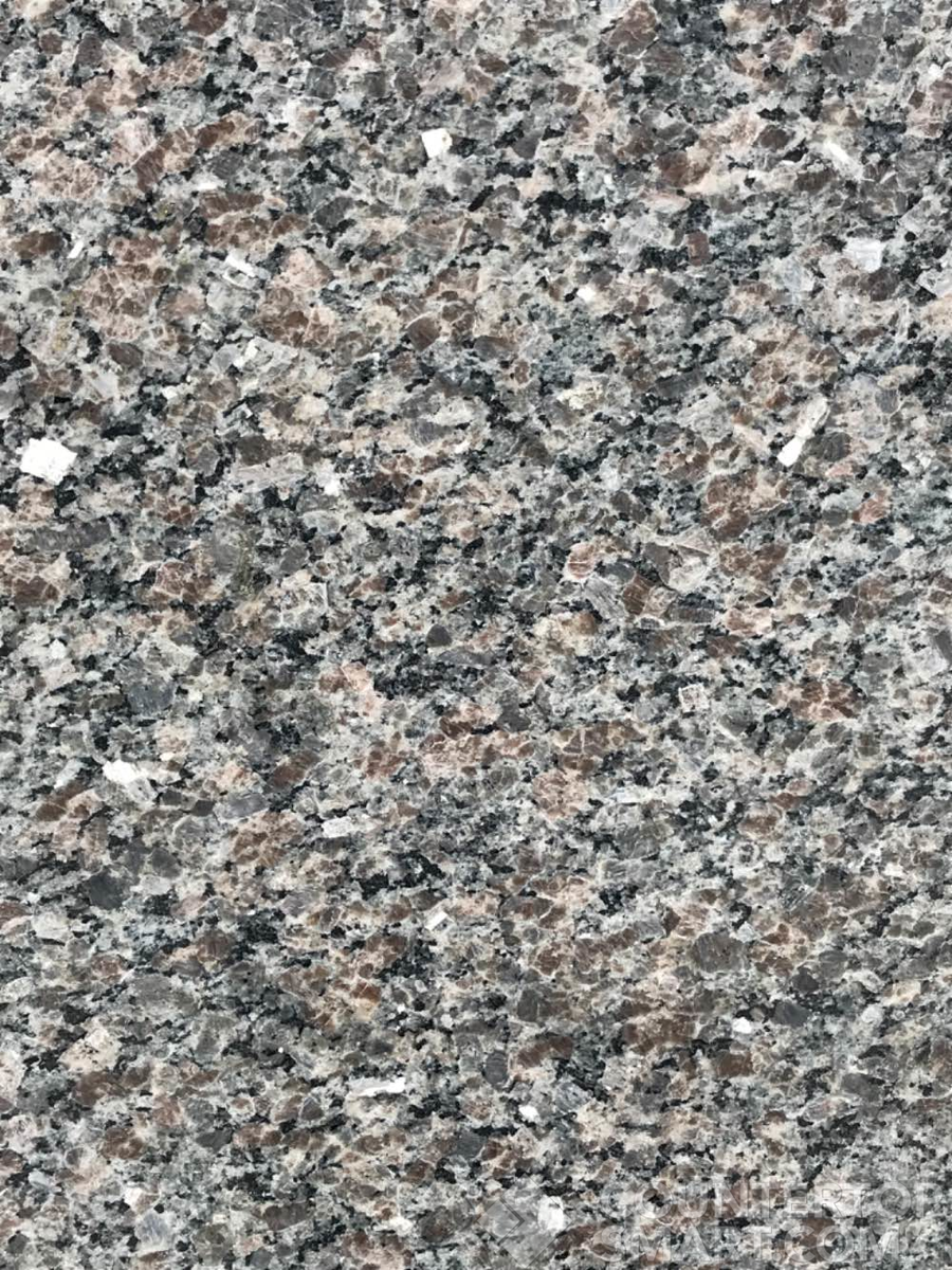 Closeup image of Autumn Brown Granite countertop slab