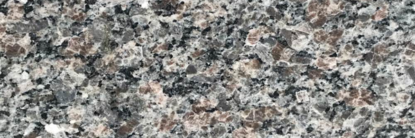 Closeup image of Autumn Brown Granite countertop slab