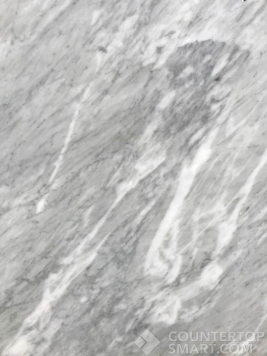 Closeup image of Carrara Marble countertop slab