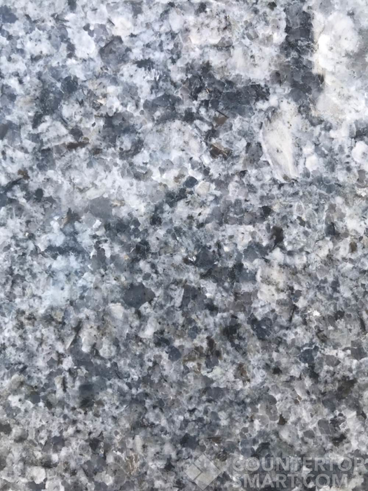 Closeup image of Azul Platino Granite countertop slab