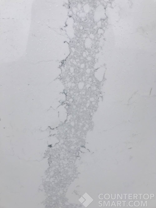 Closeup image of Obsolete Remnants Marble countertop slab