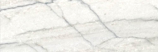 Closeup image of White Macaubas Quartzite countertop slab