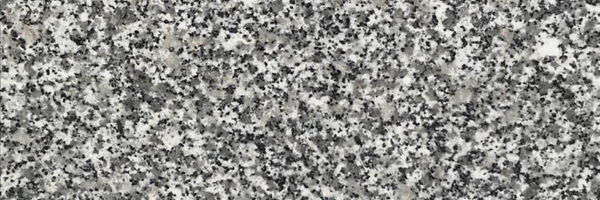 Closeup image of Luna Pearl Granite countertop slab
