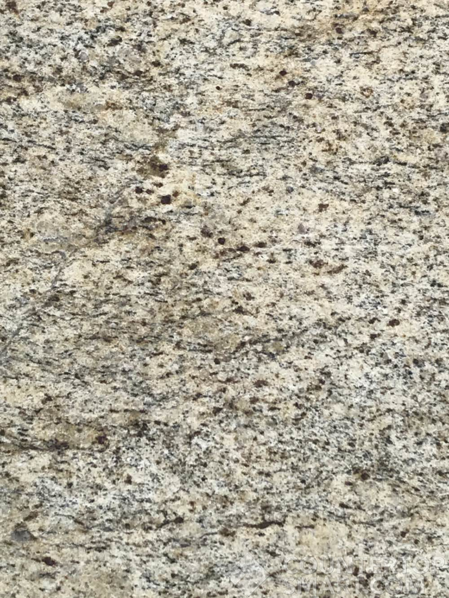 Closeup image of Giallo Imperial Granite countertop slab