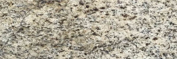 Closeup image of Giallo Imperial Granite countertop slab