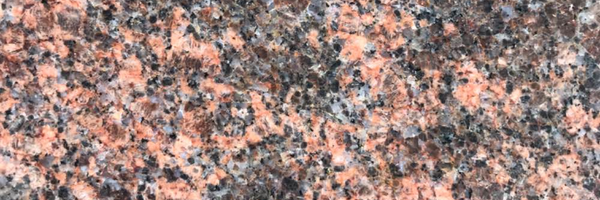 Closeup image of Tan Brown Granite countertop slab