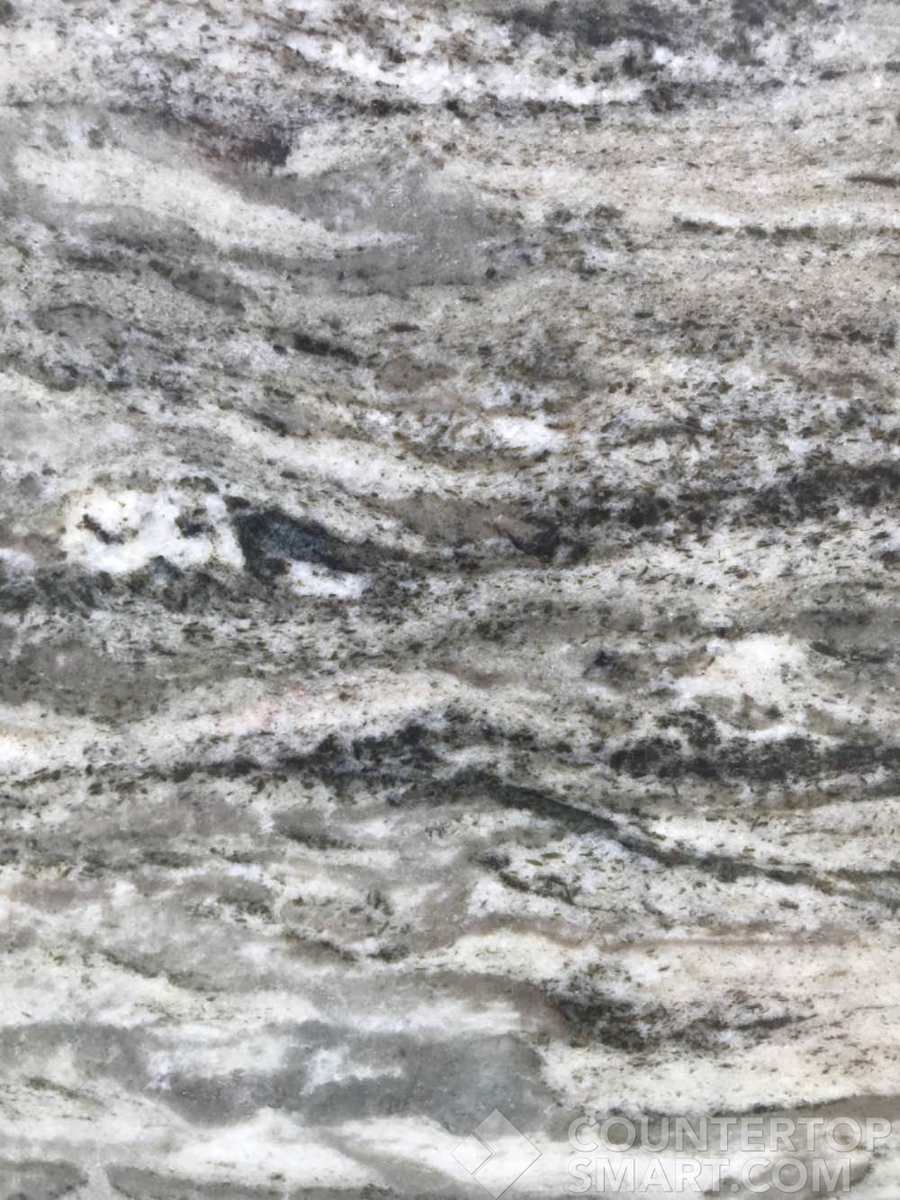 Closeup image of Fantasy Brown Granite countertop slab