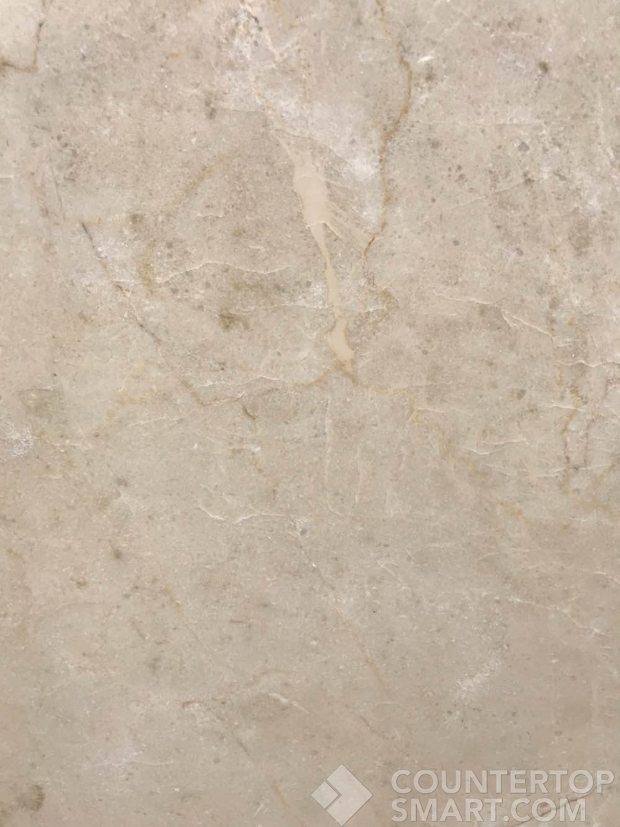 Closeup image of Crema Marfil Marble countertop slab
