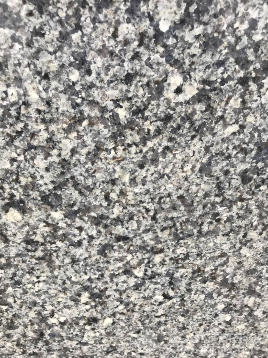 Closeup image of Azul Platino Granite countertop slab
