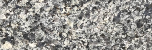 Closeup image of Azul Platino Granite countertop slab
