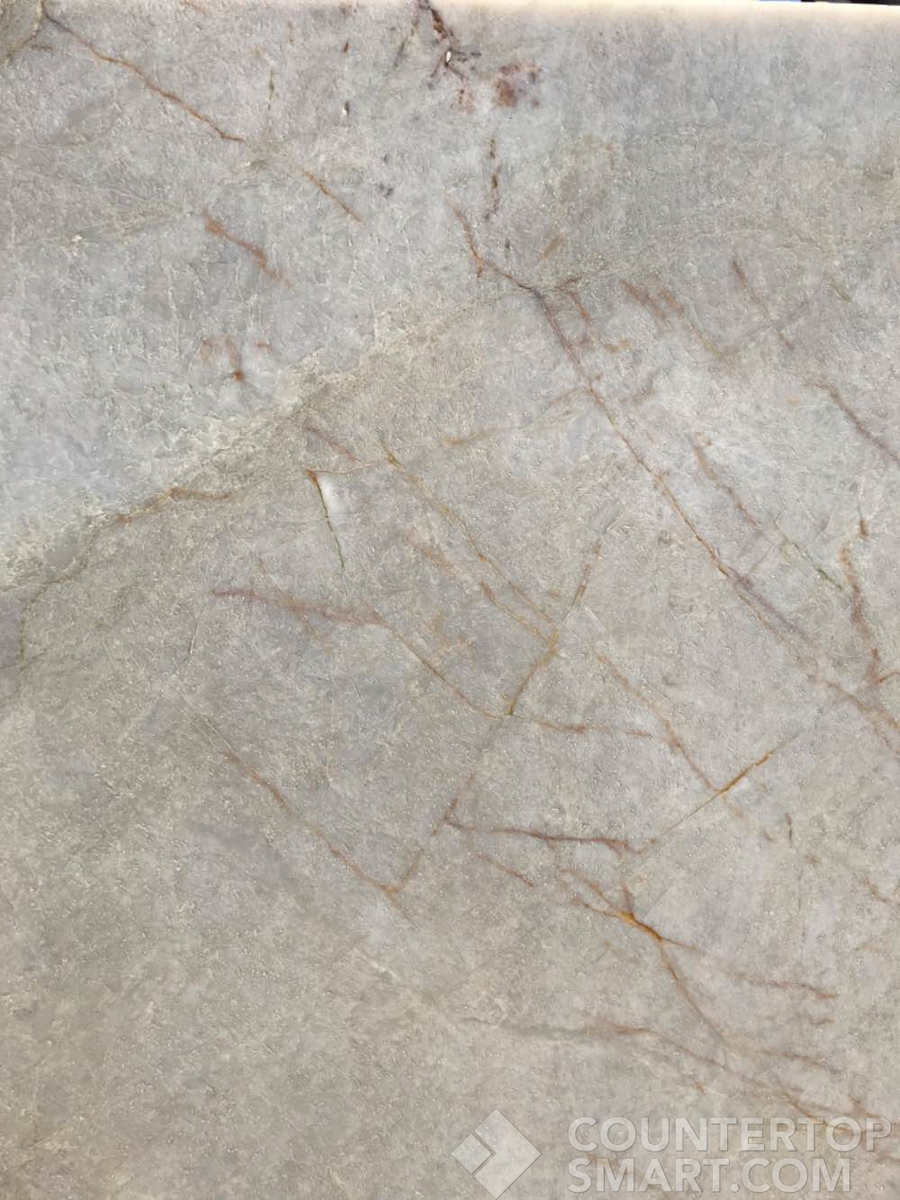 Closeup image of Taj Mahal Grey Quartzite countertop slab