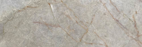 Closeup image of Taj Mahal Grey Quartzite countertop slab