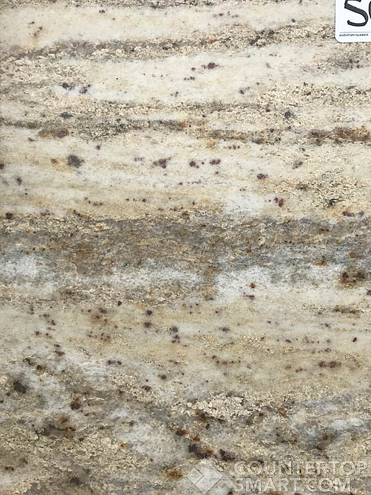 Closeup image of Colonial Cream Granite countertop slab