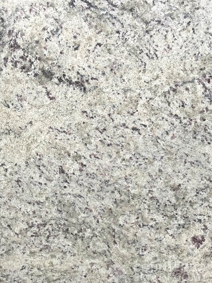 Closeup image of Giallo Fiesta Grey Granite countertop slab