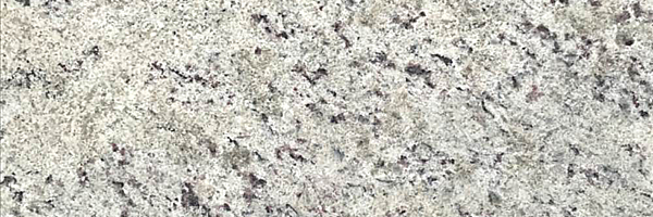 Closeup image of Giallo Fiesta Grey Granite countertop slab