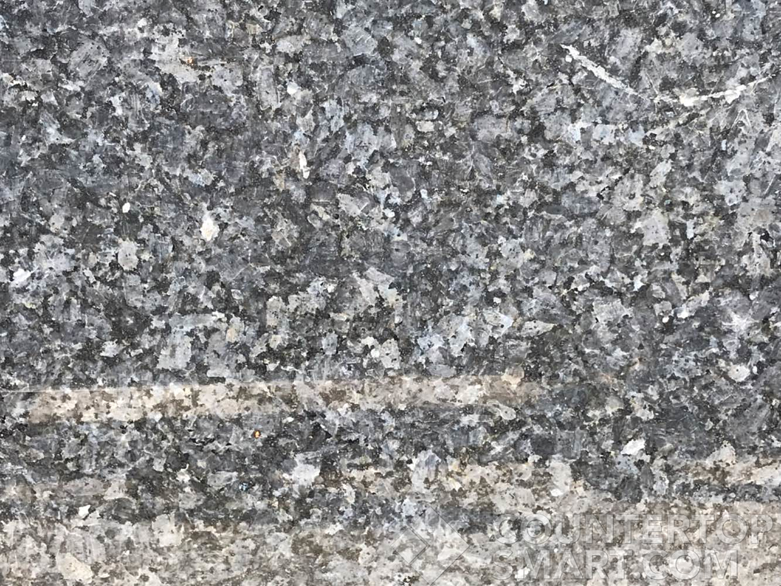 Closeup image of Blue Pearl Black Granite countertop slab