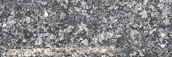 Closeup image of Blue Pearl Black Granite countertop slab