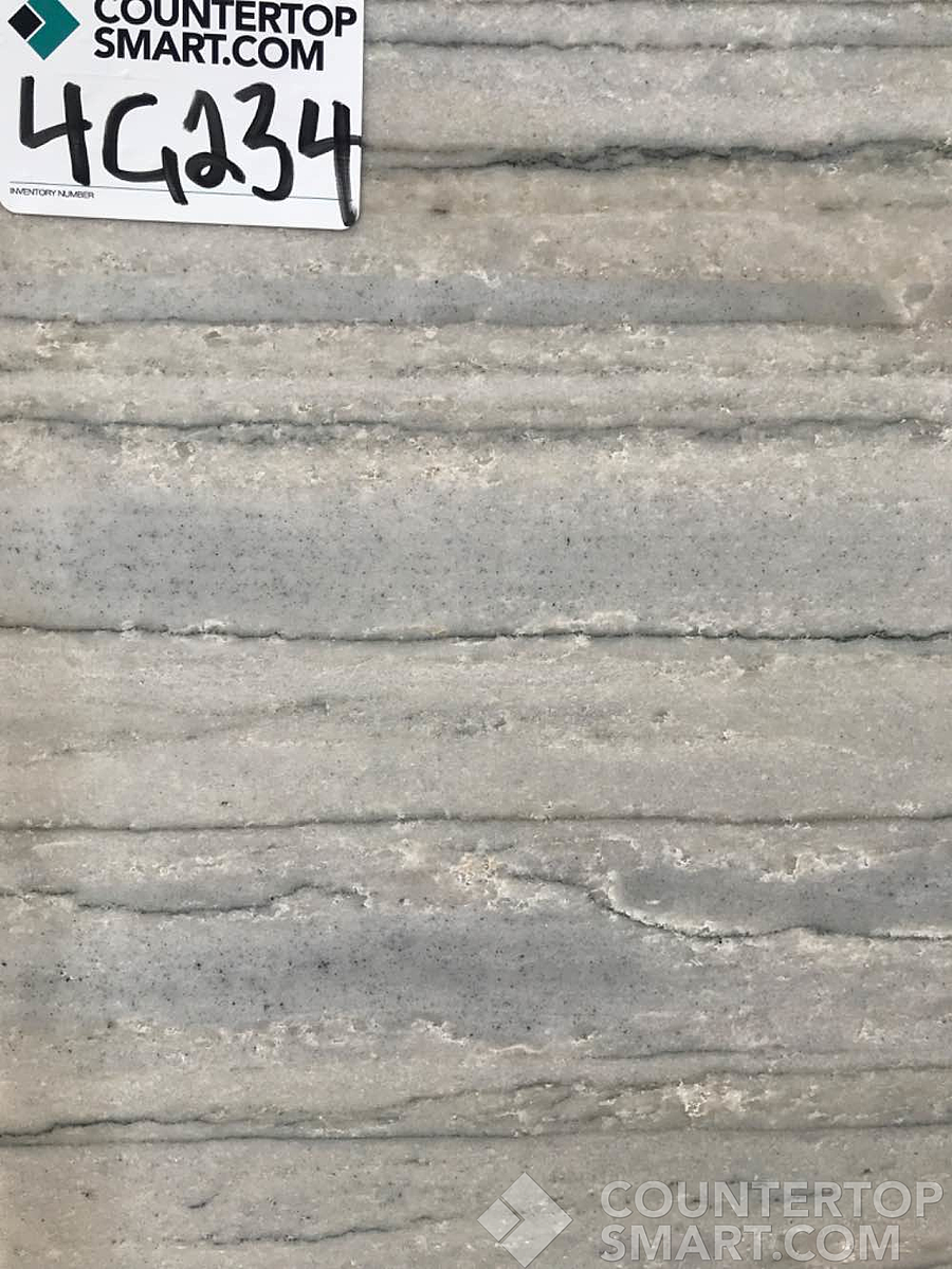 Closeup image of White Macaubas Quartzite countertop slab