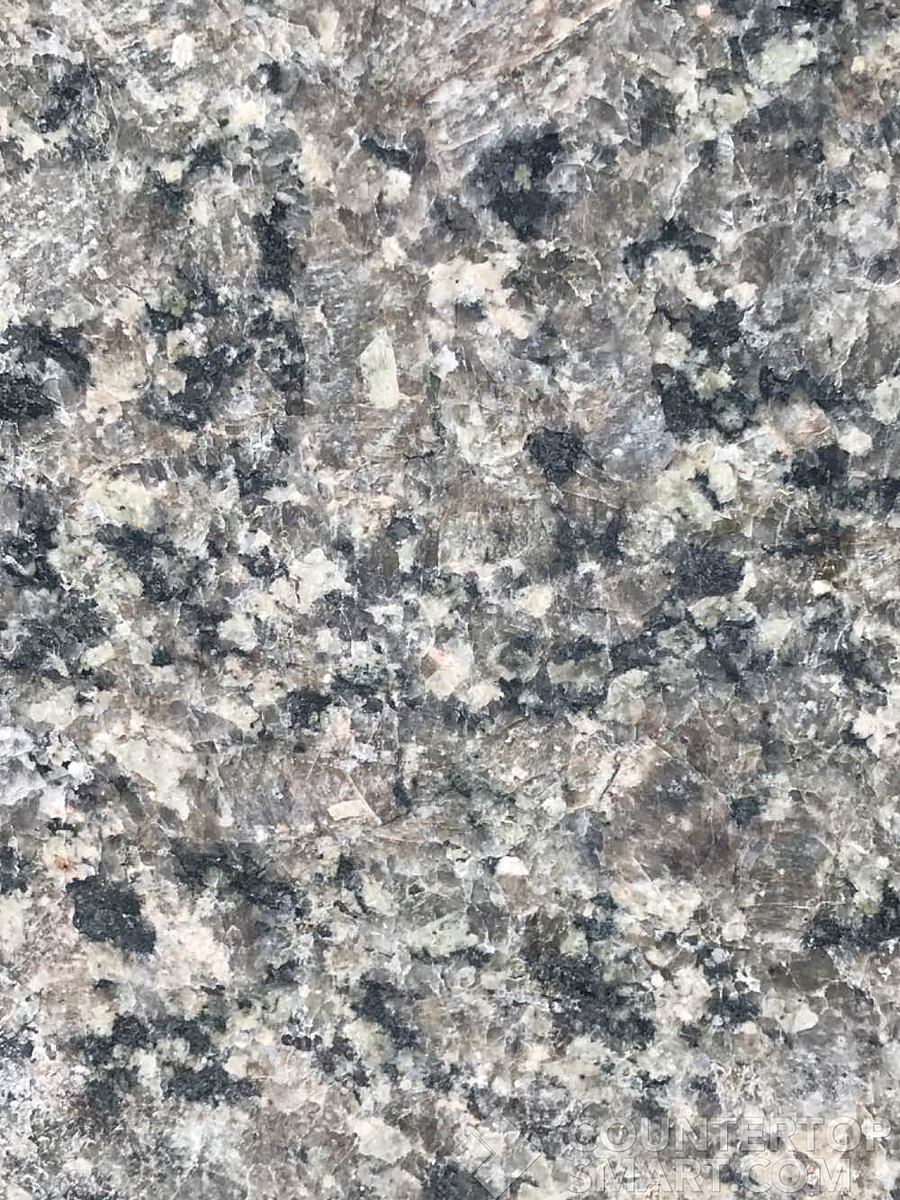 Closeup image of Arctic Pearl Granite countertop slab