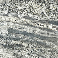 Closeup image of Monte Cristo Grey Granite countertop slab