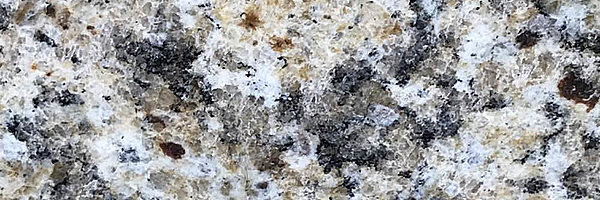 Closeup image of Santa Cecilia Brown Granite countertop slab