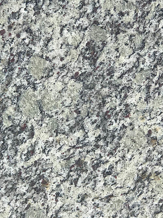Closeup image of Kashmir White Granite countertop slab