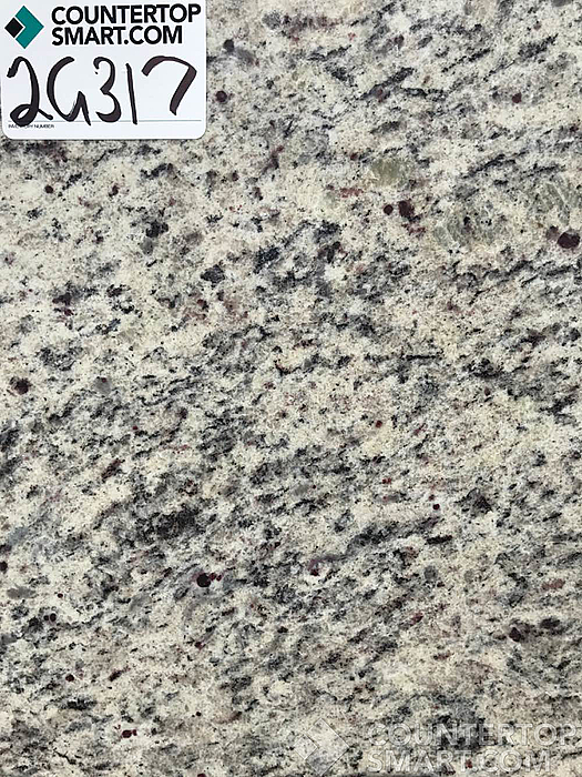 Closeup image of Dallas White Granite countertop slab