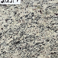 Closeup image of Dallas White Granite countertop slab