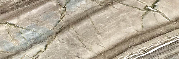 Closeup image of Obsolete Remnants Marble countertop slab