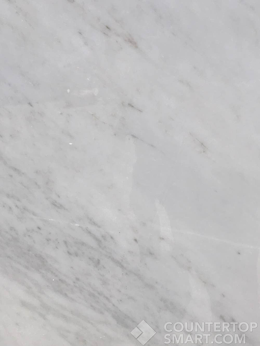 Closeup image of Carrara Marble countertop slab