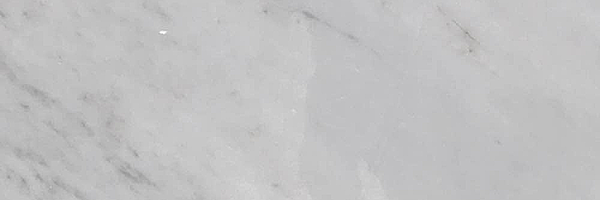 Closeup image of Carrara Marble countertop slab