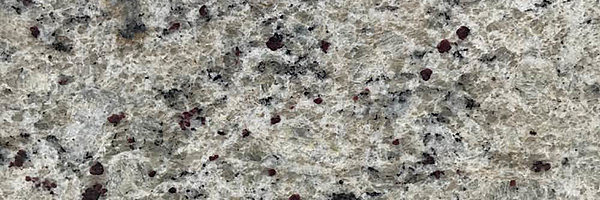 Closeup image of Giallo Fiesta Grey Granite countertop slab