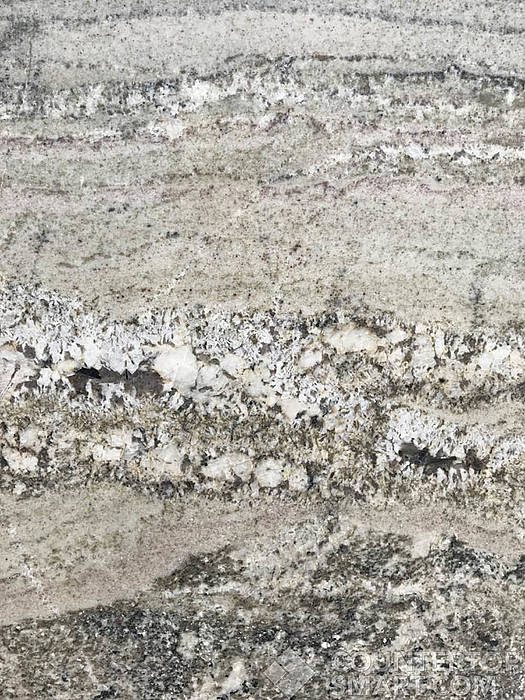 Closeup image of Monte Cristo Grey Granite countertop slab