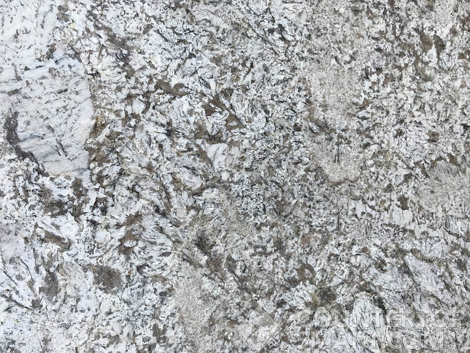 Closeup image of Crema Typhoon Granite countertop slab