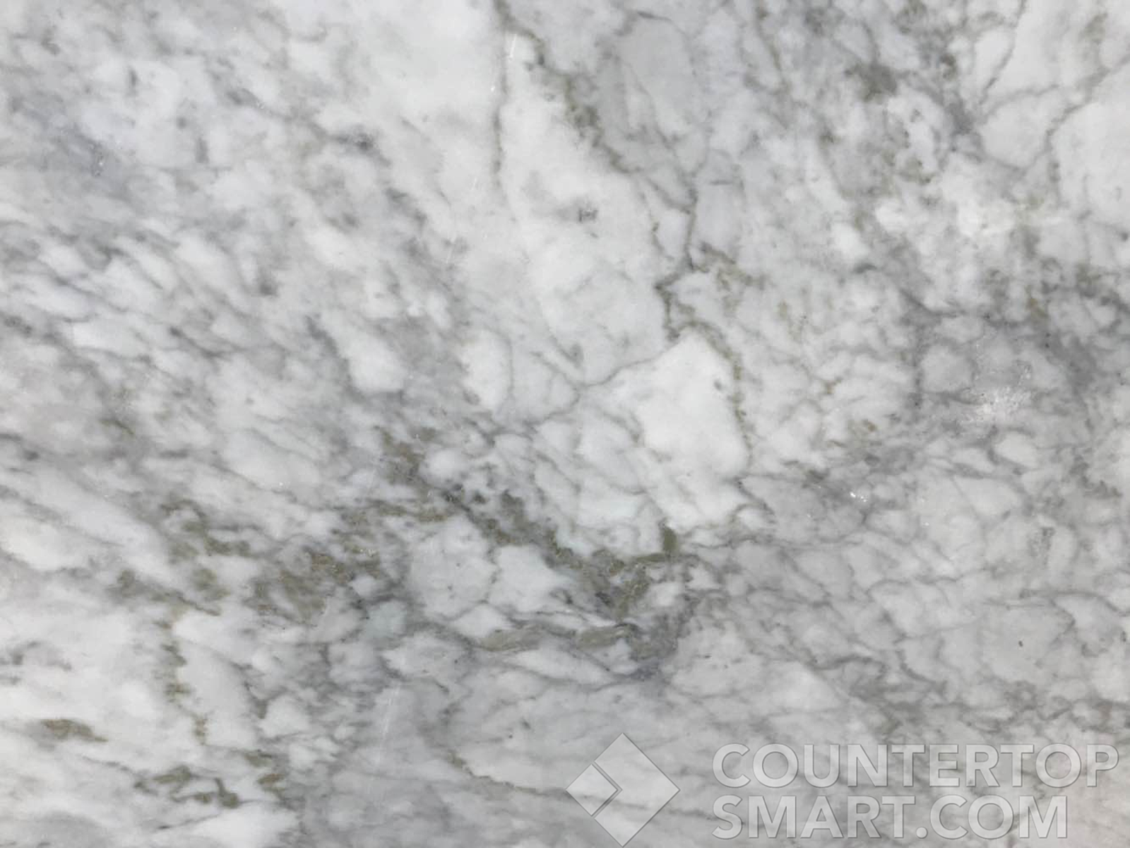 Closeup image of Carrara Marble countertop slab