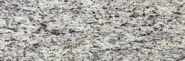 Closeup image of River White Granite countertop slab