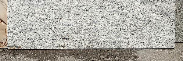 Full image of River White Granite countertop slab