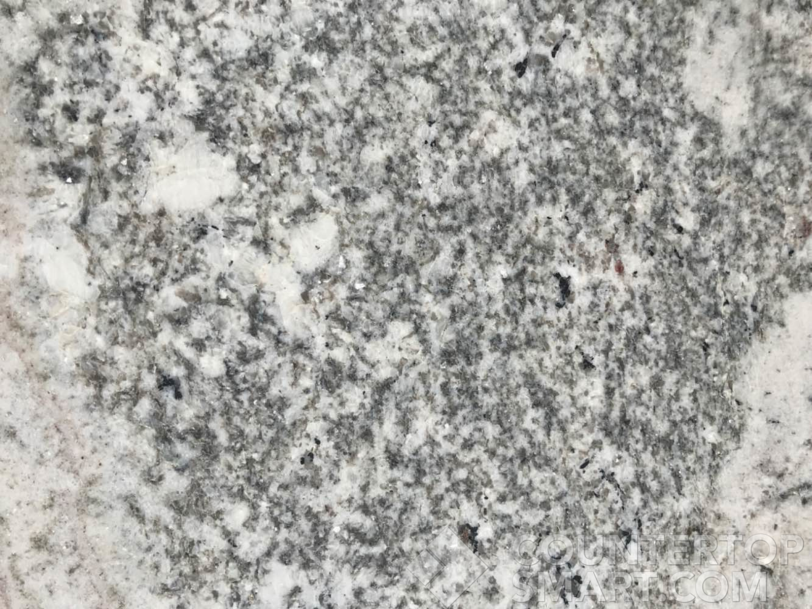 Closeup image of Monte Cristo Grey Granite countertop slab