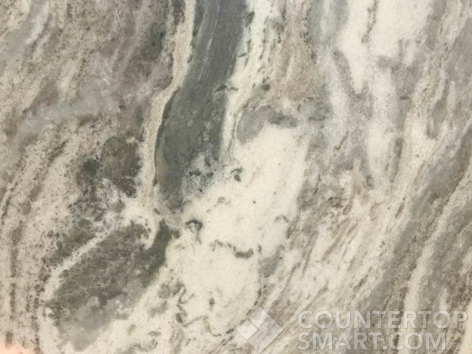 Closeup image of Fantasy Brown Granite countertop slab
