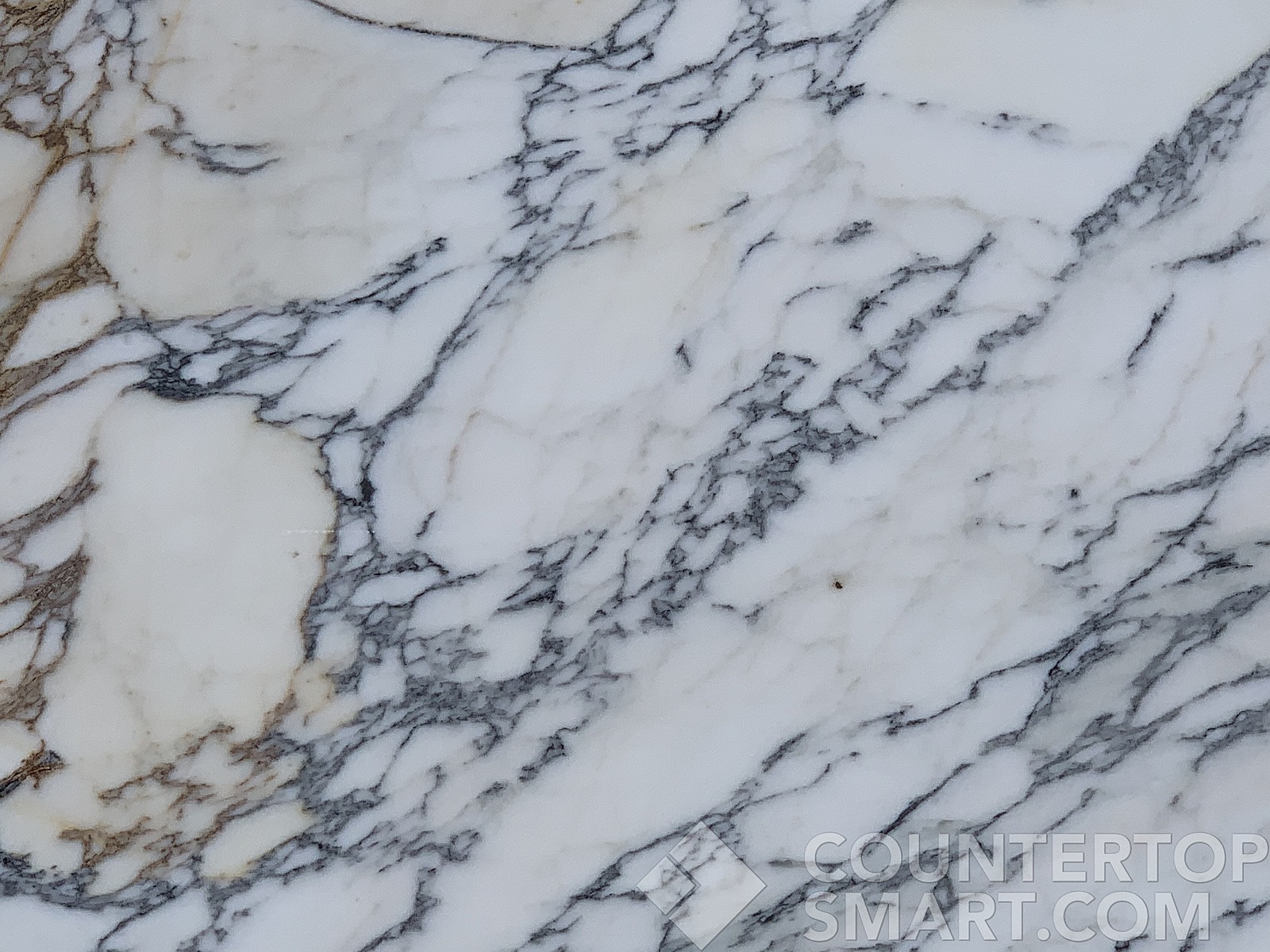 Closeup image of Calacatta Gold Marble countertop slab