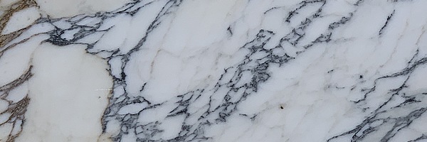 Closeup image of Calacatta Gold Marble countertop slab