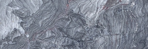 Closeup image of Diamante Nero Granite countertop slab