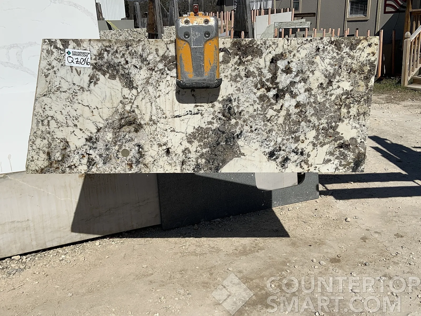 Full image of Delicatus White Grey Granite countertop slab
