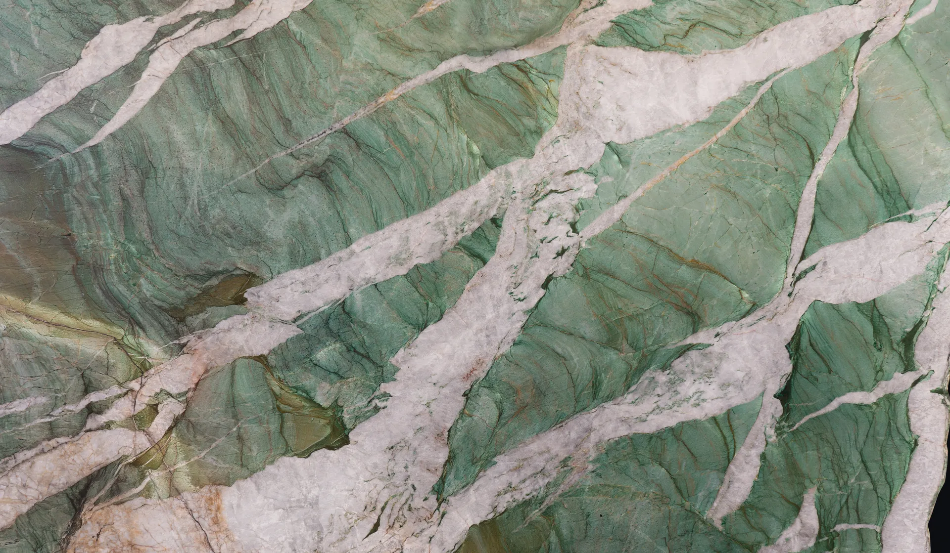 Closeup image of Botanic Crystal 1st Choice Green Quartzite countertop slab