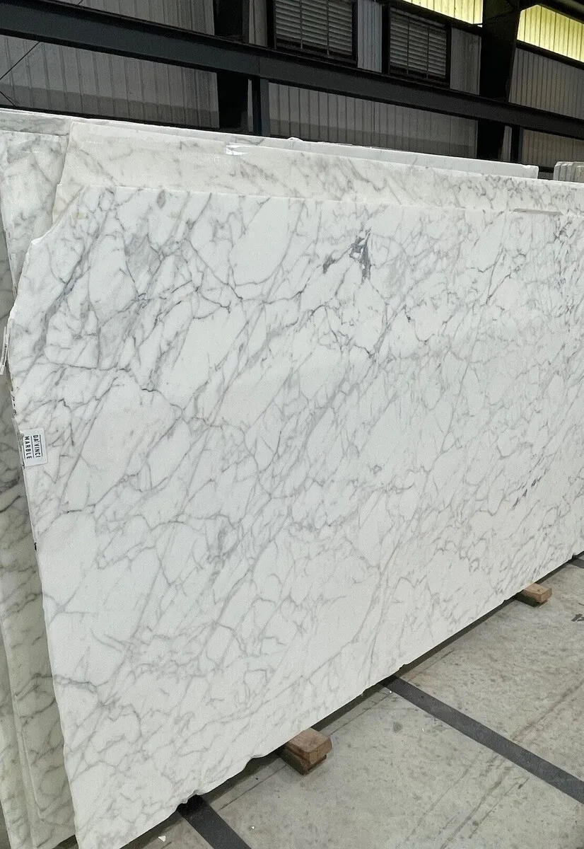 Closeup image of Calacata Spider White Marble countertop slab