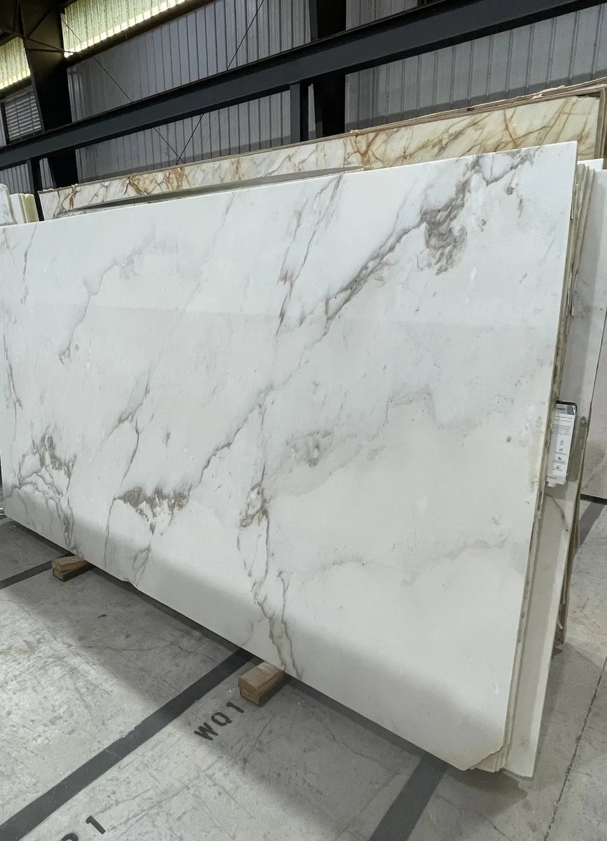 Closeup image of Cremo Delicato Extra White Marble countertop slab