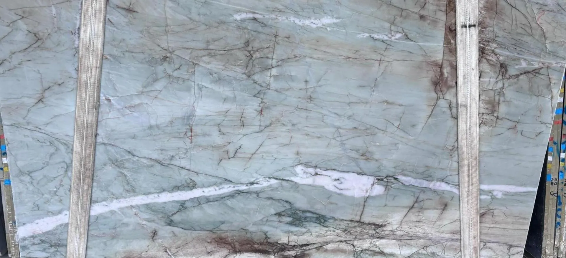 Closeup image of Crystal Acqua 1st Choice Green Quartzite countertop slab