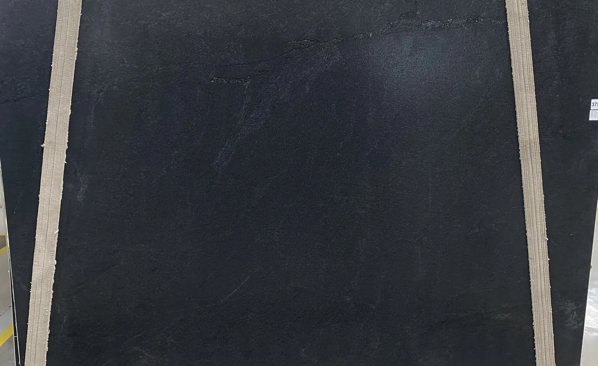 Closeup image of Ebony (Negresco) Black Granite countertop slab